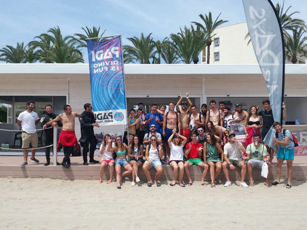 a group of people on a beach